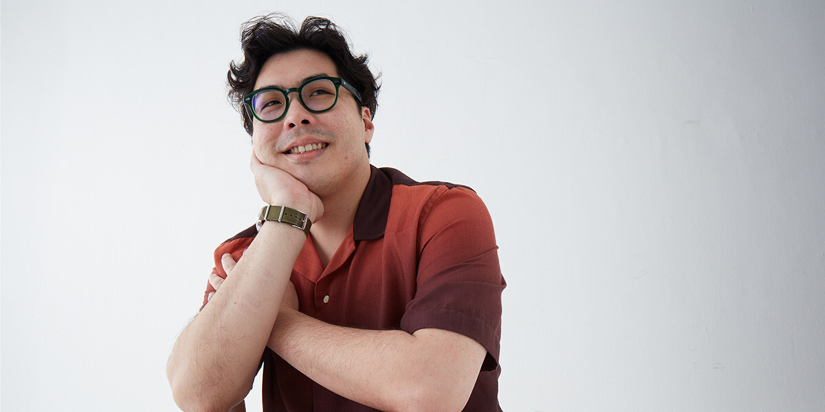 Photo of Jenhan smiling.